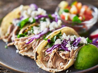 bigstock-Street-tacos-with-carnitas-225381346